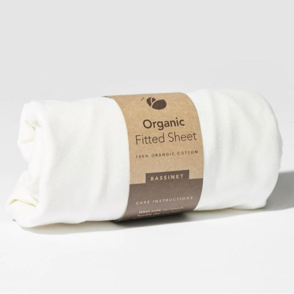 Guava Lotus organic bassinet sheets.